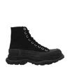 Alexander Mcqueen Leather And Rubber Exaggerated-sole Ankle Boots In Black