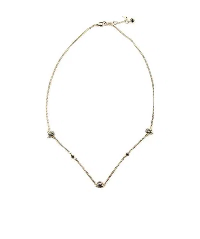 Alexander Mcqueen Triple Skull Necklace In Yellow