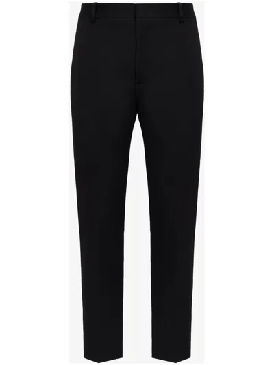 Alexander Mcqueen Tapered-leg Wool Trousers In Black