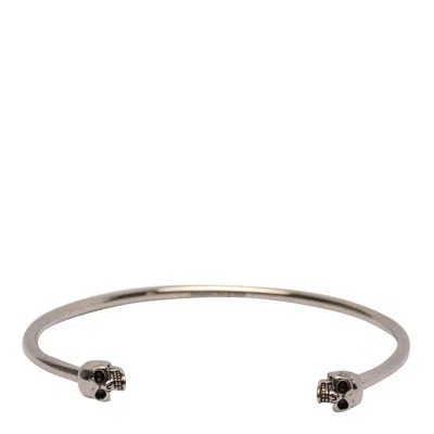 Alexander Mcqueen Twin Skull Bracelet In Metallic