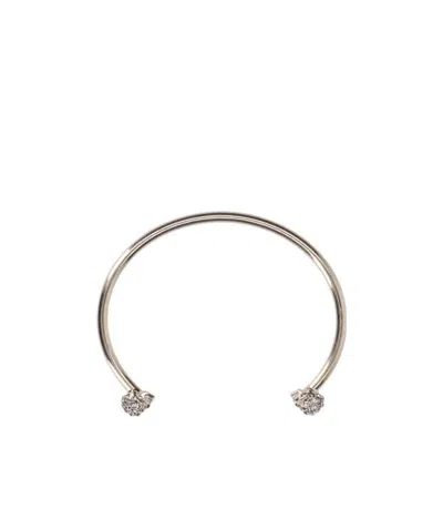 Alexander Mcqueen Twin Skull Bracelet In Yellow
