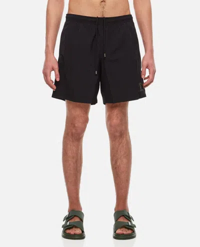 Alexander Mcqueen Varsity Skull Swimshorts In Brown