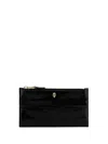 Alexander Mcqueen Skull Embossed Zipped Wallet In Black