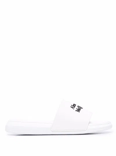 ALEXANDER MCQUEEN ALEXANDER MCQUEEN MEN WHITE LOGO POOL SLIDES IN RUBBER