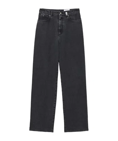 ALEXANDER MCQUEEN ALEXANDER MCQUEEN WIDE-LEG SKULL PLAQUE JEANS