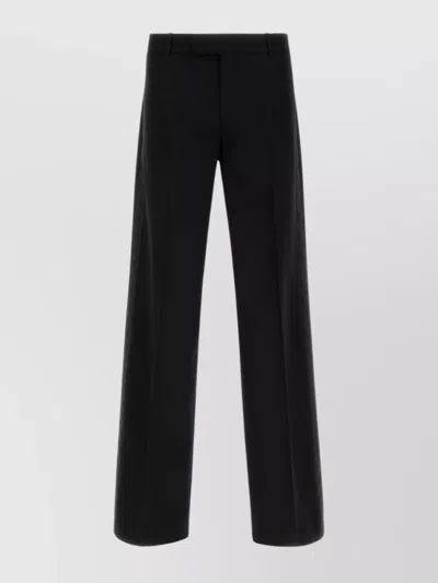 ALEXANDER MCQUEEN WIDE LEG WOOL TROUSERS WITH FRONT AND BACK POCKETS
