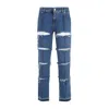 Alexander Mcqueen Low-rise Distressed Jeans In Blue