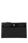Alexander Mcqueen Skull Embossed Zipped Wallet In Multicolor