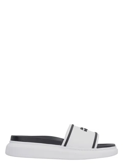 ALEXANDER MCQUEEN WOMEN'S LOGO DETAIL RUBBER SLIDES