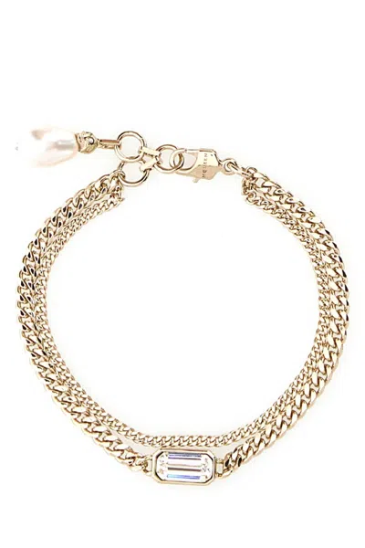 Alexander Mcqueen Women Platinum Metal Skull Bracelet In Gold
