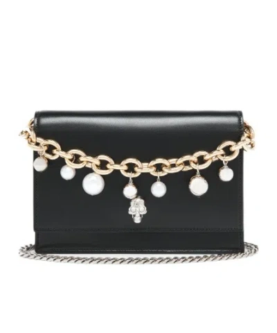 ALEXANDER MCQUEEN ALEXANDER MCQUEEN SKULL EMBELLISHED CHAINED CLUTCH BAG