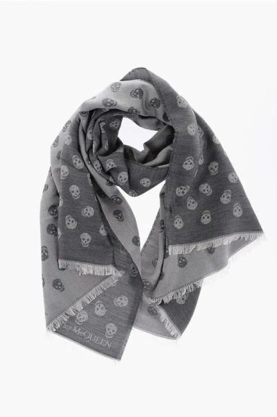 Alexander Mcqueen Wool And Silk Scarf With All-over Skulls In Gray