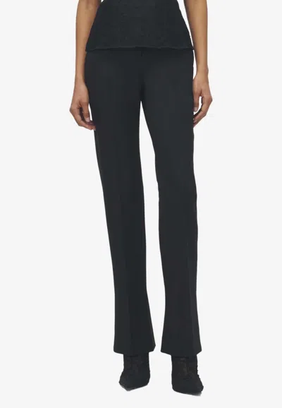 Alexander Mcqueen Wool Flared Tailored Pants In Black