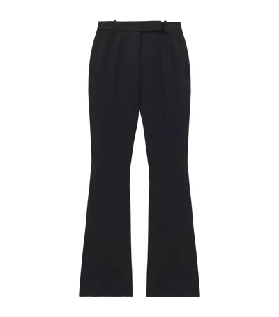 Alexander Mcqueen Wool Flared Trousers In Black