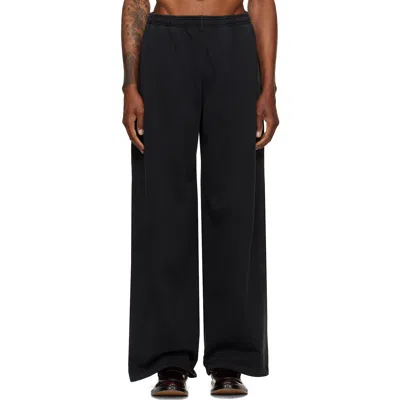 Alexander Wang Black Logo Print Oversized Sweatpants In 011 Washed Black