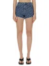 Alexander Wang All-over Logo Printed Denim Shorts In Blue