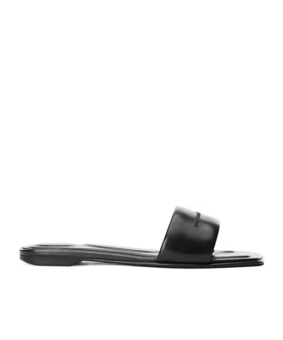 Alexander Wang Embossed-logo Slides In Black
