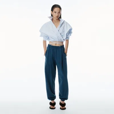 Alexander Wang Logo Waistband Pleated Sweatpants In Vintage Navy