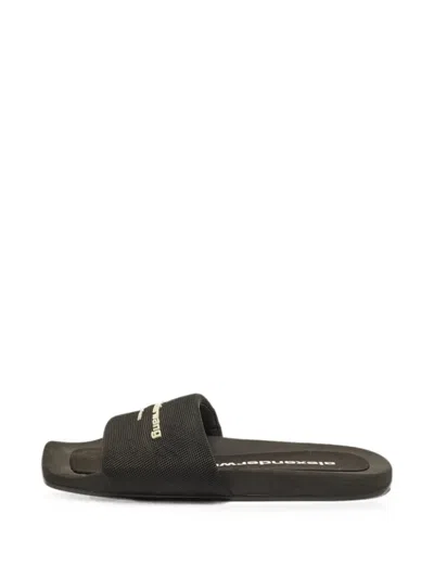 Pre-owned Alexander Wang Logo-embossed Slides In Black