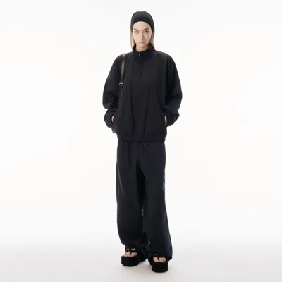 Alexander Wang Perforated Logo Mid-rise Track Pant In Black