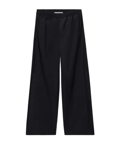 Alexander Wang Perforated Logo Mid-rise Track Pant In Blue