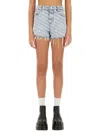 Alexander Wang All-over Logo Printed Denim Shorts Clothing In Blue