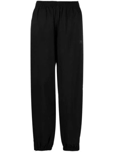 Alexander Wang Embossed Logo Pants In Black