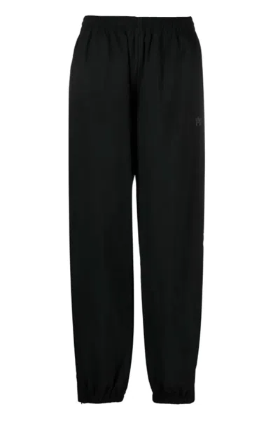 Alexander Wang Embossed Logo Pants In Black