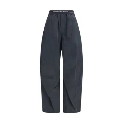 ALEXANDER WANG TROUSERS WITH ELASTIC WAISTBAND AND CONTRASTING JACQUARD WOMEN'S LOGO