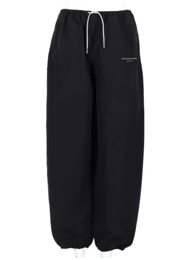 Alexander Wang Wide-leg Track Pants With Subtle Logo Detail In Black