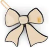 Alexandre De Paris Side Bow Barrette In Beige