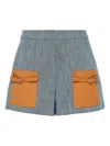 Alexis Mccoy Leather-pocket Denim Shorts In Blue