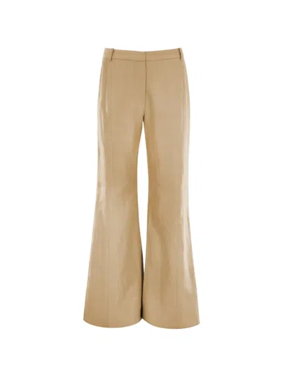 Alexis Samwell Flared Trousers In Brown