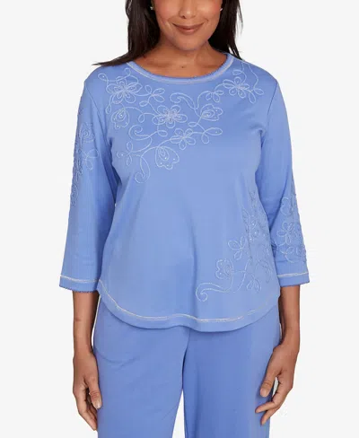 Alfred Dunner Petite Casual Vibe Asymmetrical Floral Embroidered Detail Top In Blue