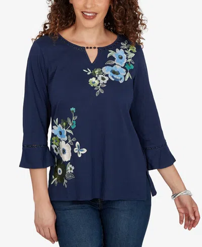 Alfred Dunner Petite Indigo Girls Asymmetric Sequin Flowers Knit Top In Blue