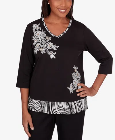 Alfred Dunner Petite Opposites Attract Animal Trim Flower Top In Black