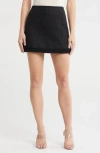 Alice And Olivia Alice + Olivia Riley Fringe Edge Tweed Miniskirt In Black