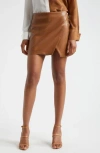 Alice And Olivia Alice + Olivia Siobhan Faux Leather Wrap Miniskirt In Camel