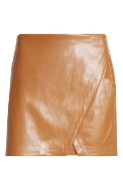 Alice And Olivia Alice + Olivia Siobhan Faux Leather Wrap Miniskirt In Camel