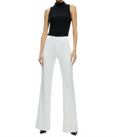 Alice And Olivia Lara Mid Rise Side Stripe Slit Pant In Ecru In Black