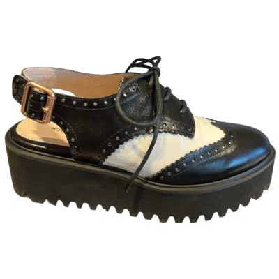 All Black Women's Spectator 23 Mules In Black In Multi