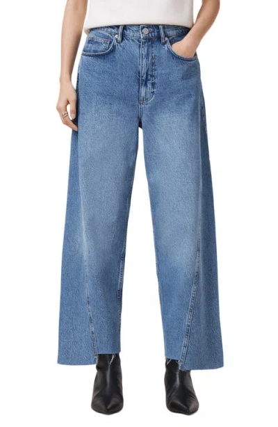 Allsaints Fox Asymmetric Raw Hem Wide Leg Jeans In Light Indigo