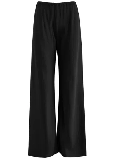 Almada Label Bias-cut Wide-leg Satin Trousers In Black