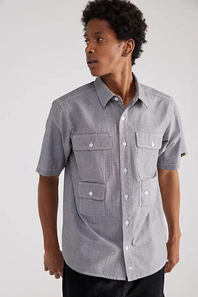 ALPHA INDUSTRIES MULTI-POCKET CHAMBRAY SHORT SLEEVE SHIRT TOP IN AIRCRAFT GRAY, MEN'S AT URBAN OUTFITTERS