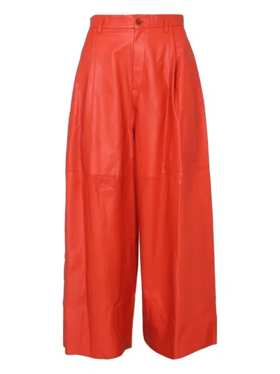 Alysi Pleated Leather Trousers In Orange