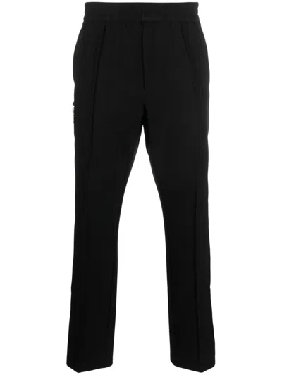 Alyx Decorative Buckle-detail Tapered Trousers In Schwarz