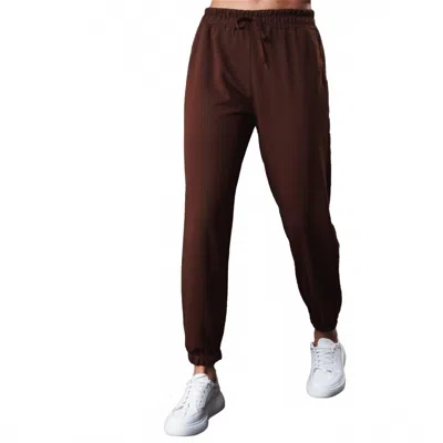 Ambar High-rise Cotton Jogger Pants In Brown