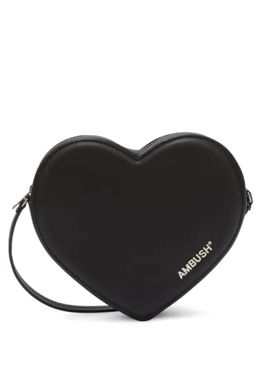 Ambush Flat Heart Crossbody Bags In Black