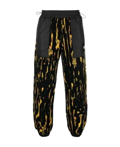 AMBUSH AMBUSH ALL-OVER GRAPHIC PRINT TRACK PANTS