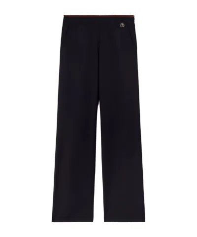 Ambush Slim-cut Logo-plaque Trousers In Black